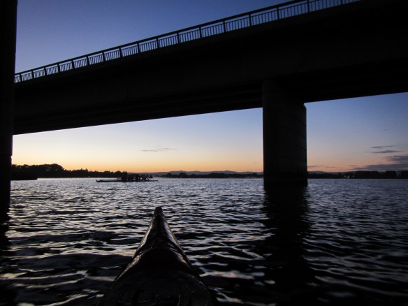  The scull's cutting through the pre-dawn glow
