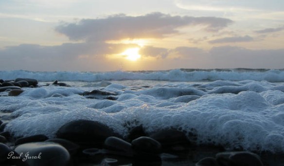The sounds of the waves crashing on the shoreline were so calming. 