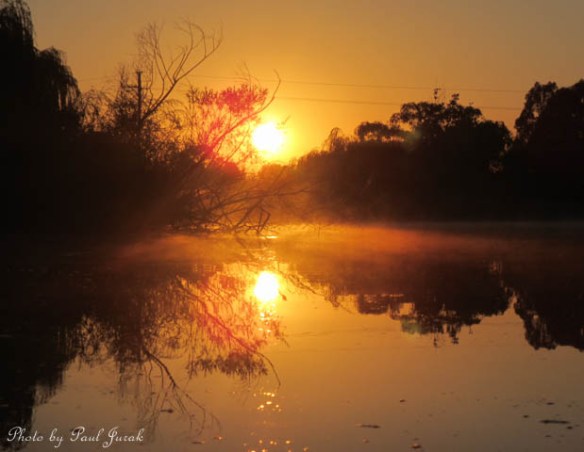 Love how the mist is just starting dance on the waters surface.