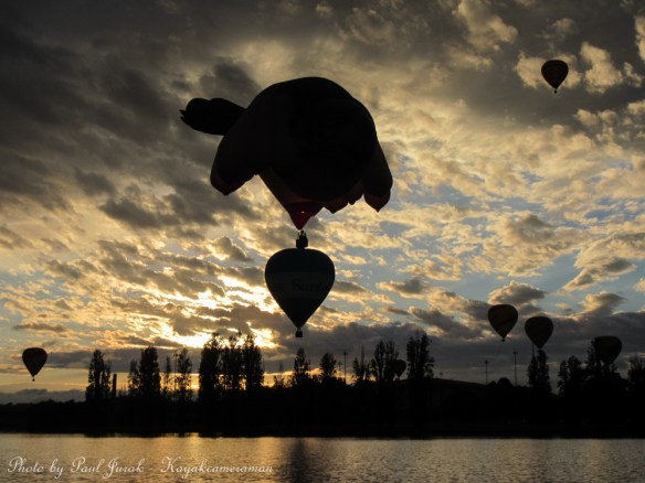 Synchronized Ballooning. The Sky Whale was having an early morning dance   